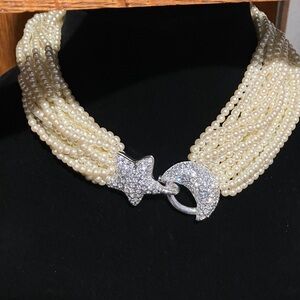 Elegant Pearl Necklace with Star and Moon Clasp
